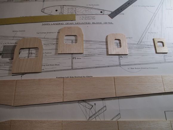 These bottom of these four Formers are not at 90 degress as you can see the fuselage tapers.  I matched the angle of 93 degrees using my disc sander to make sure that I will have perfect contact between the bottom of each Former and the sheeting.