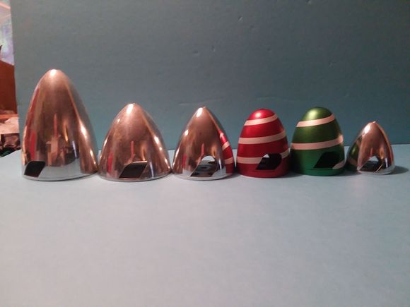 Both the Red & Green spinners have already been sold but the others are NIB and all aluminum for only $5.00 each.