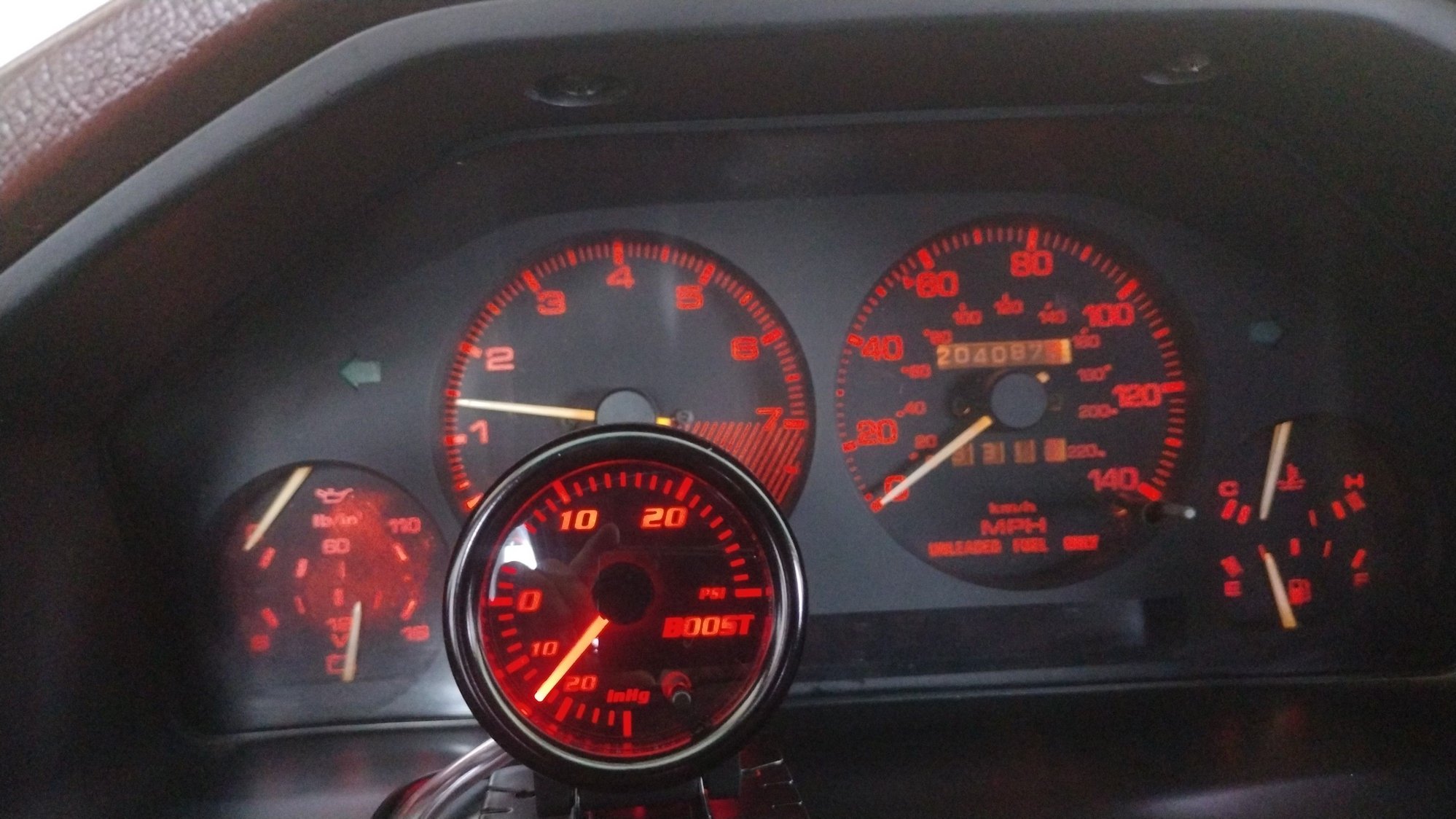 Amazon boost gauge, RE amemiya gauge was $460.00 dollars more expensive. So we went with Amazon. It does change colors. 