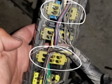These 2 sections circled in WHITE arent connected to anything.(this is the Front Harness that is currently on the car)