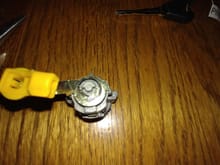 Here's a look at the lock disassembly.  The lock is held together with a c-clip that can be removed with a flat-blade screwdriver or needle nose pliers