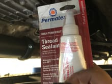 Permatex high temp thread sealant.