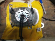 Installed in the housing with modified washers