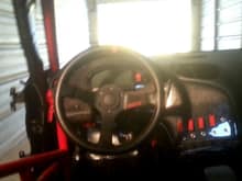 Super crappy photo, but a rough estimate of how it ties in :)

Slope on switches is deliberate to match the steering wheel spoke

Thanks!