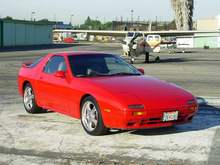 86 RX7 at the airport

89 mirrors, taillights, spoiler, paint scheme
Tokico struts &amp; springs (lowered 3/4&quot;)
Suspension Techniques sway bars f&amp;r
Energy Suspension bushings
American Racing wheels 17 x 7.5
Durun tires, 235/45ZR-17