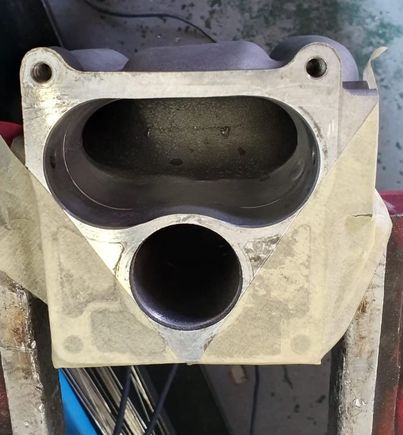 Got the intake double throttle removed and machined out 