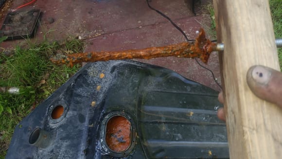 Used electrolysis to clean rust from my gas tank, this is after 24 hours