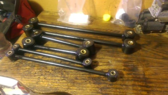 FB rear axle control arms and Watts linkage with new Energy Suspension graphite-impregnated polyurethane bushings