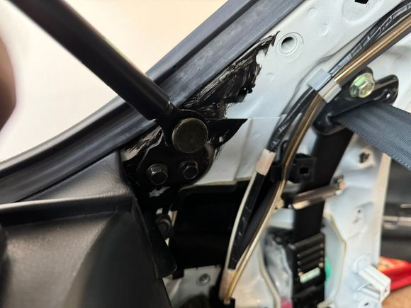 Taking apart the interior to get to the gas strut Hatch brackets I decided to unbolt everything and use a box wrench to break loose the ball on the hatch no need to pry it off the gas strut since it will be replaced. 