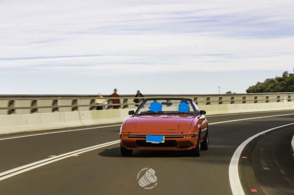 Heading north on the Sea Bridge with my two sons in the car.