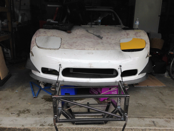 We were able to contact the original builder of the car. Chassis Dynamics built many of the top IMSA chassis in the 80's and 90's and made this car in 1990. They are still around and amazingly still had the blueprints of the chassis. They built us a front clip which we will attach at a local race car shop.