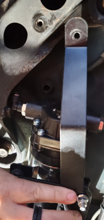 This is with the Subframe bolt in pump bracket. (just out of frame, but you can see where the 90 degree pump fitting makes contact with the bolt). 