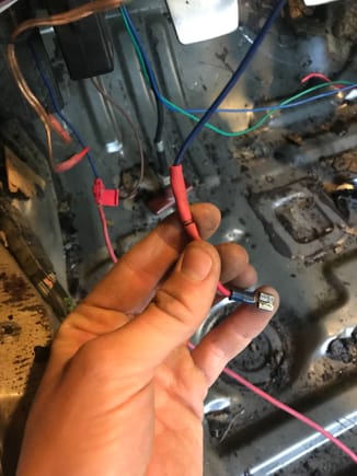 This is where the red wire connects from the fuel pump pictures, and then from here it goes through the firewall and connects to the battery.