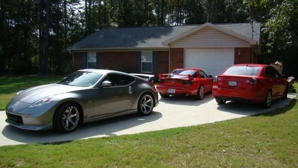 The House with the m'cars. 2009 Nissan 370Z Nismo edition, 1996 RHD FD LS2 V8, and the wife's car, 2009 Pontiac G8 GXP (6.2 LS3)