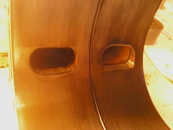 exhaust ports.....my work on the right, an un-named shop's work on the left.