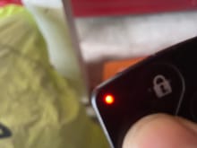 This is the light on the CC proximity fob. If this flashes when you press a button then your battery in the CC proximity fob is good, otherwise replace it with CR2025, which you can order pretty cheap from Amazon or Ebay. Installation is pretty easy, search Youtube for video instructions or PM me.