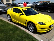 The day I found my RX8, my black truck in the background.