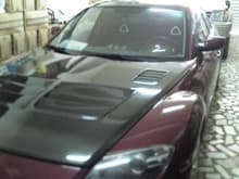 My '06 6SP-MT RX-8. Crappy phone pic. Should get a better camera .. lol .. two tone dark red and black paintjob. And my '00 Toyota Landcruiser Prado lifted in the background.