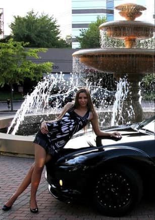 Another of my girl and the car. Her Lexus IS in the background