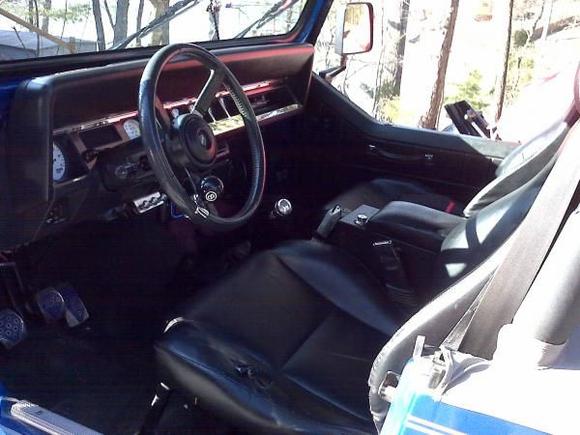 Jeep at Lake House 4 1 10

Custom: Seats, White gauges, Stainless dash, 1100W stereo, etc

Big on the suicide knob... you need it to get the most out of the shopping cart turning radius of this thing (turns in 2/3 the space that the S2000 does).  Not big on the 8 ball thing but I haven't thought of a good way to fill in the 8 and make it solid round.