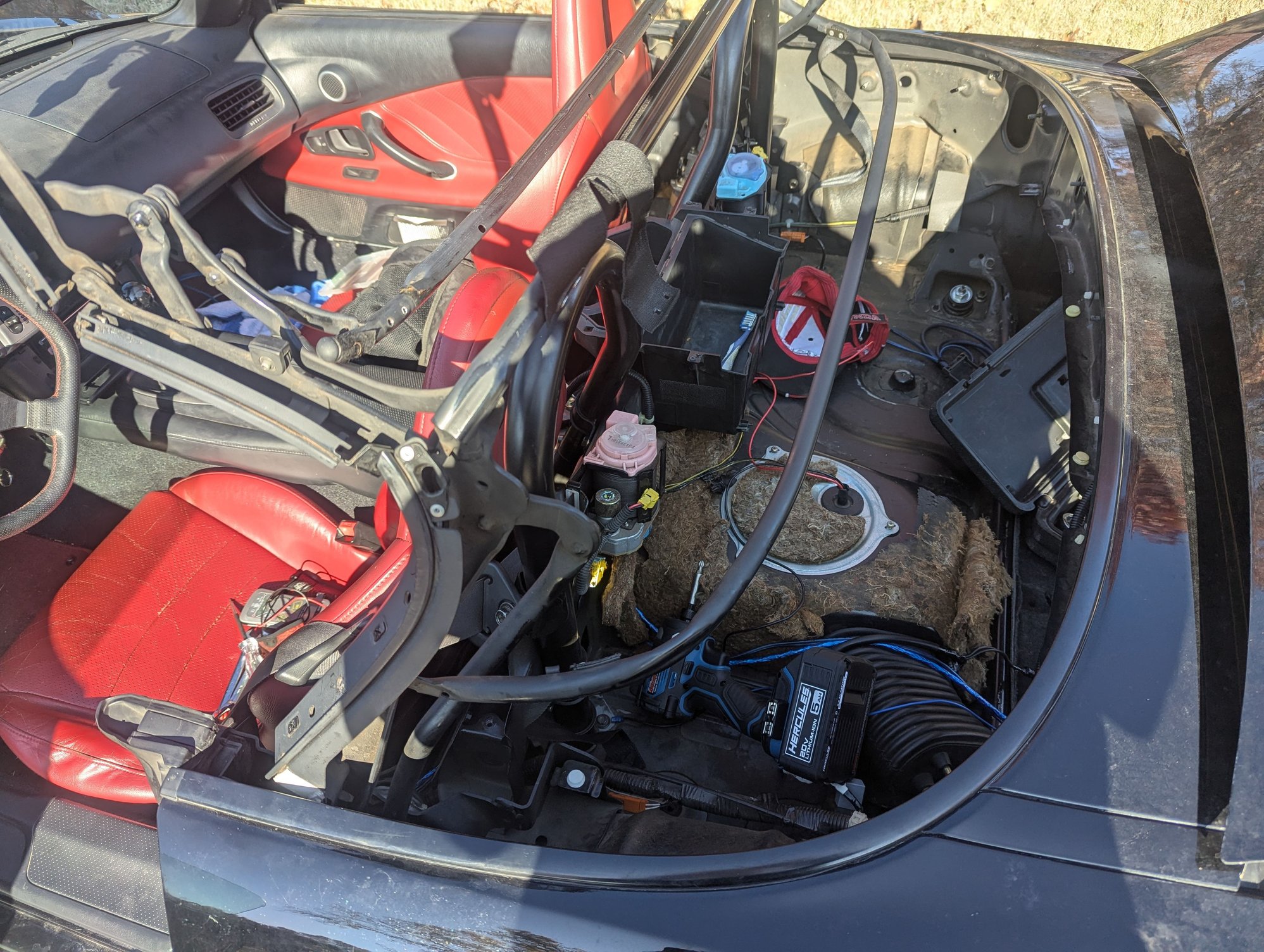 No top = easy access. I'm actually pretty lucky that this happened while I have my Robbins top out to re-glue the rear window. 
