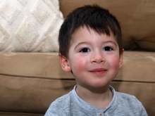 Cole is two. Looks just like his Dad in this pic. He's a handful, a ball of energy and most affectionate.
