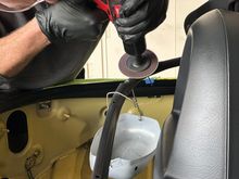 He measure meticulously and drilled out each hole cleanly. Use a flat disc to clean the edges. He also filled in the exposed metal with paint. 