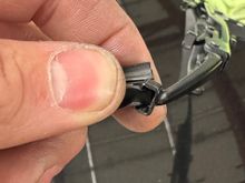 Fold it down like so and pull, and it should come free.