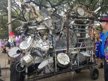 This percussion float included a number of attached hanging drum sticks anyone could use to join in on the beat.