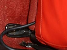 Hose exiting seat back.JPG