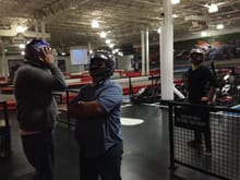 Co workers suiting up at K1Speed