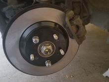 New rotors, new pads, new grease (copper and silicone). Afterwards, did a complete brake flush via the popular gravity method. Nice strong brakes now. 