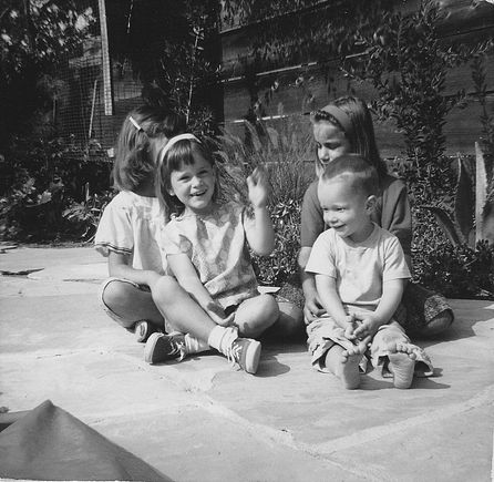 Sunny SoCal by the pool as kids in North Hollywood.