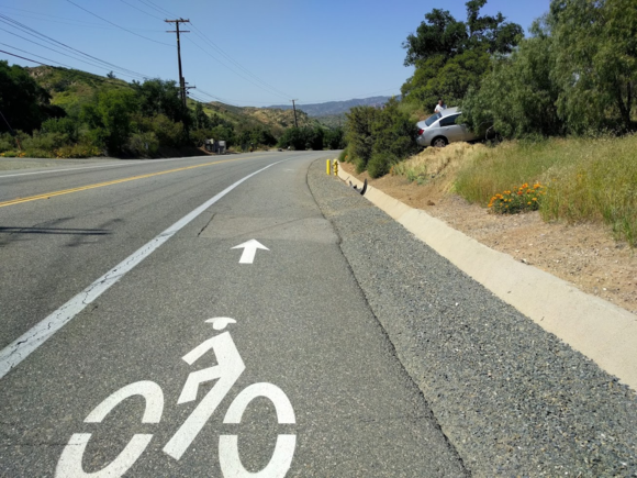 4-10-2017.  I saw this car fly into the air as I was riding down the hill.
