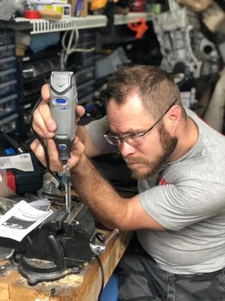 but first! I want a real shift knob, So i dremmeled down the shifter shaft to the correct thickness so i could thread it for a real shift knob. 
