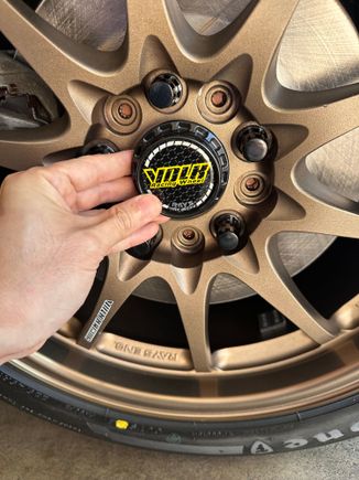 Now the decision is which center cap to go with. Both are from AliExpress. The black matches the lug nuts...