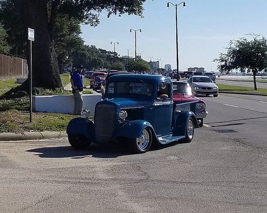 Cars are lined up for about a half mile to get in. 