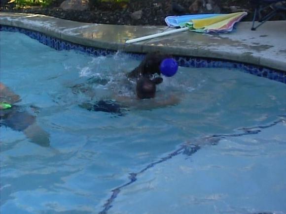 Jason and Cocoa doing water aerobics.JPG