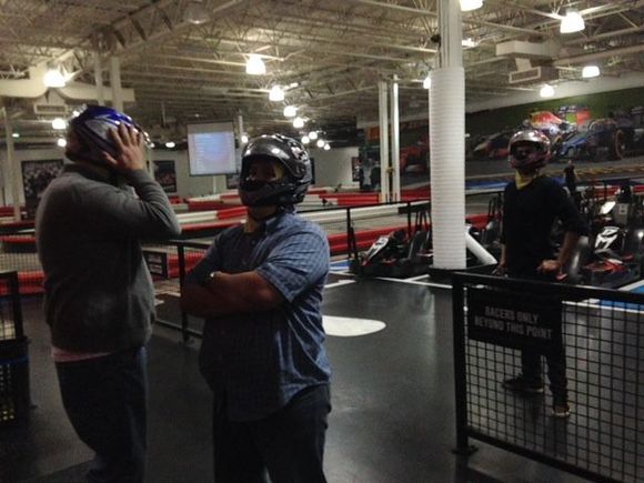 Co workers suiting up at K1Speed