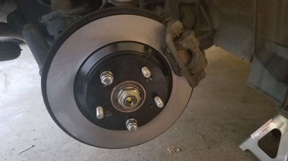 New rotors, new pads, new grease (copper and silicone). Afterwards, did a complete brake flush via the popular gravity method. Nice strong brakes now. 