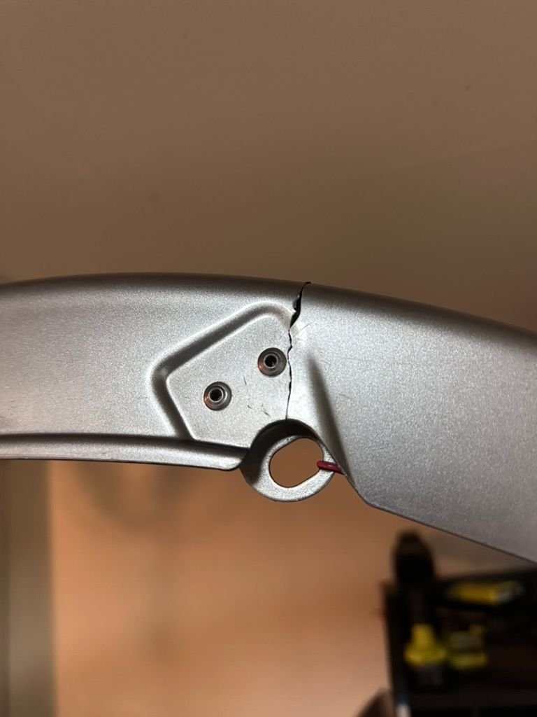 Unfortunately it's close to the mounting tabs