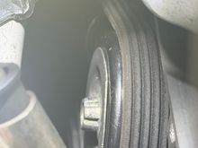 What tool can i use to take this bolt out of the idler pulley? Its not the spline socket. 