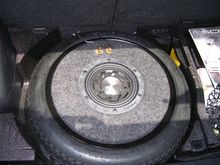 8&quot; sub custom mounted in fiberglass bowl in rear tire. 0&quot;  of space lost, 100% of awesome gained.