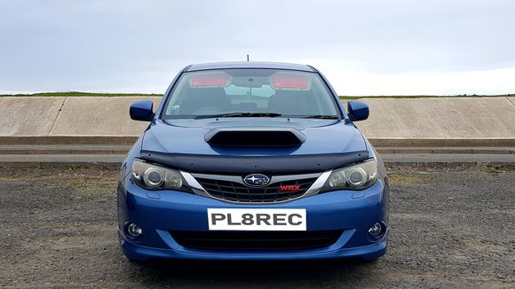 Huge carbon fiber front bonnet vent and wind deflector.