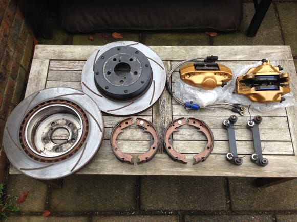 Rear Brembo conversion including as new Godspeed sleeves newage grooves discs , Kevlar pads , fitting brackets , standard handbrake shoes and braided hoses. Including receipt from Godspeed for £313 not including the £250 for the immaculate calipers. 
PRICED AT £350 all in +postage
