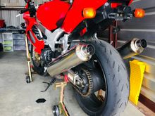 Love these PitBull stands so far and found if you put a 2x4 under the kick stand the bike is almost vertical and stable enough to use the rear stand to lift and support the bike without any worries.  