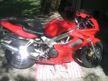 Im thinking about getting the honda emblem with the wing put on the lower fairing.  But I really want to do something bigger that covers most of the bike... Any suggestions?