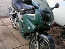 Oft repaired fairings with plastic patio furniture paint. And double pinstripes! Need real working mirrors tho.