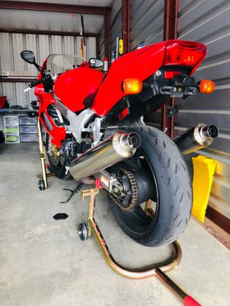 Love these PitBull stands so far and found if you put a 2x4 under the kick stand the bike is almost vertical and stable enough to use the rear stand to lift and support the bike without any worries.  
