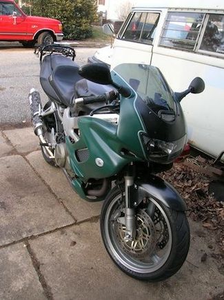 Oft repaired fairings with plastic patio furniture paint. And double pinstripes! Need real working mirrors tho.